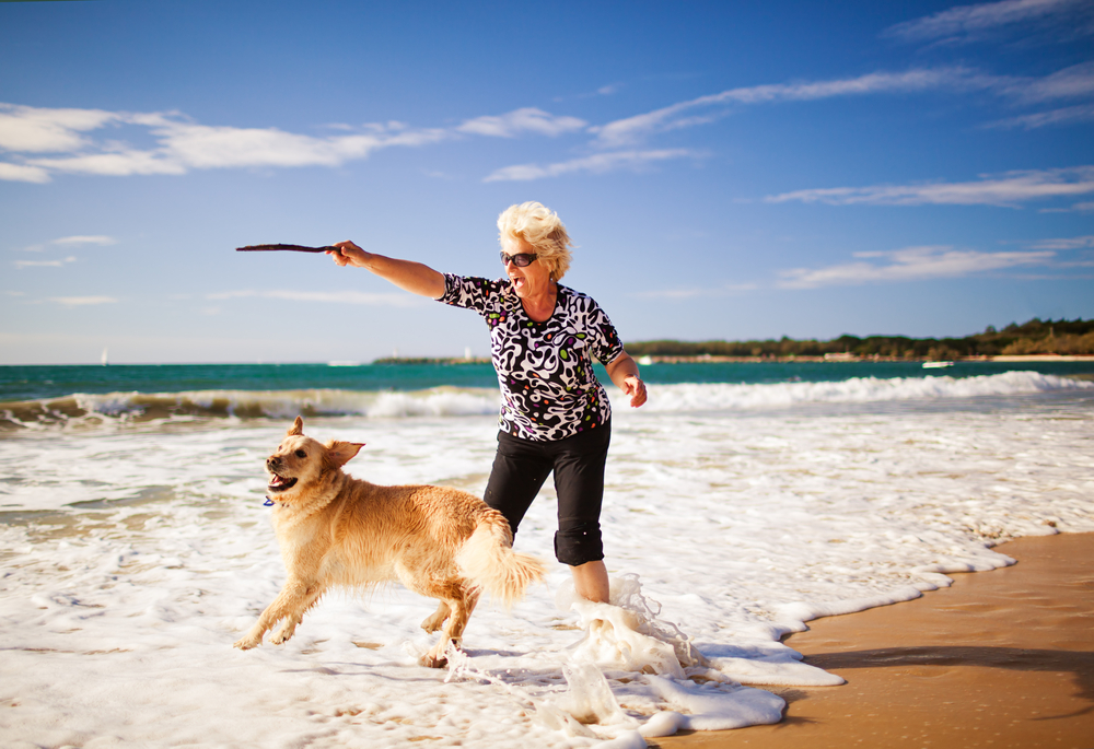 woman with dog on beach.jpg